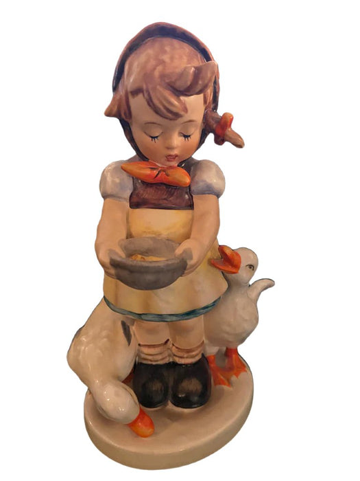 Porcelain figurine of a girl in a brown dress holding a bowl with two white geese by her side on a round base. - Vintage Goebel Hummel Figurines, Goose Girl, 47 3/0, TMK 3, 4.25” - Decoration Color_Multi colors, Decoration Price_ 100 to 250, Decoration Size_Small, Decoration Style_Traditional, Decoration_ Porcelain / ceramic, Decoration_Figurine, Decoration_Hummel Figurin - Default Title - EZ Art, Decor & Jewelry