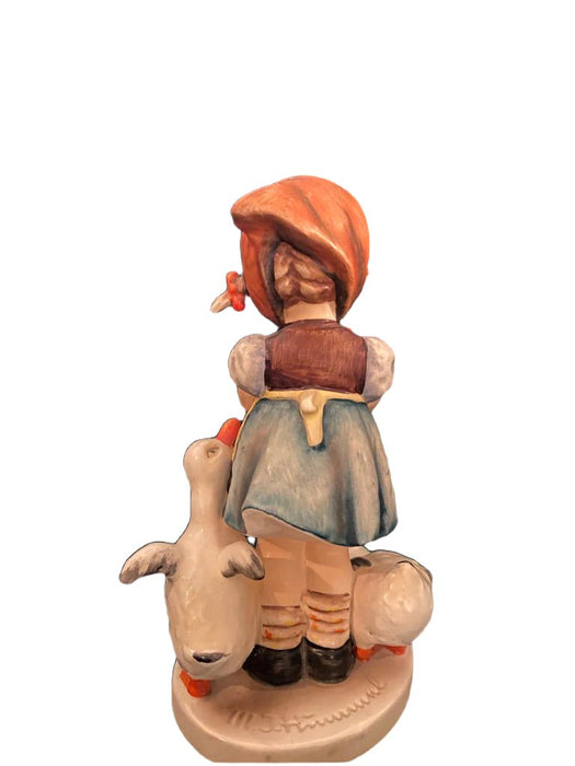 Vintage porcelain Hummel figurine of a girl in a blue dress and orange hat feeding a white goose. - Vintage Goebel Hummel Figurines, Goose Girl, 47 3/0, TMK 3, 4.25” - Decoration Color_Multi colors, Decoration Price_ 100 to 250, Decoration Size_Small, Decoration Style_Traditional, Decoration_ Porcelain / ceramic, Decoration_Figurine, Decoration_Hummel Figurin - Default Title - EZ Art, Decor & Jewelry